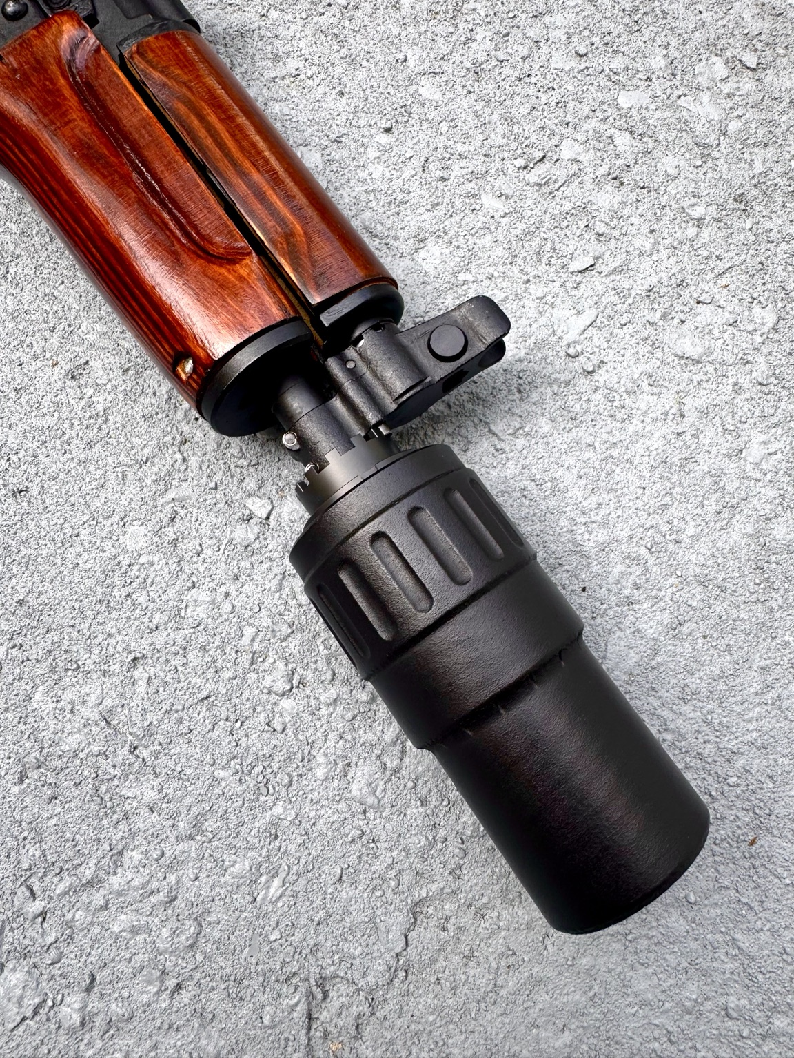 Close-up of the On My Level titanium muzzle brake hub mount