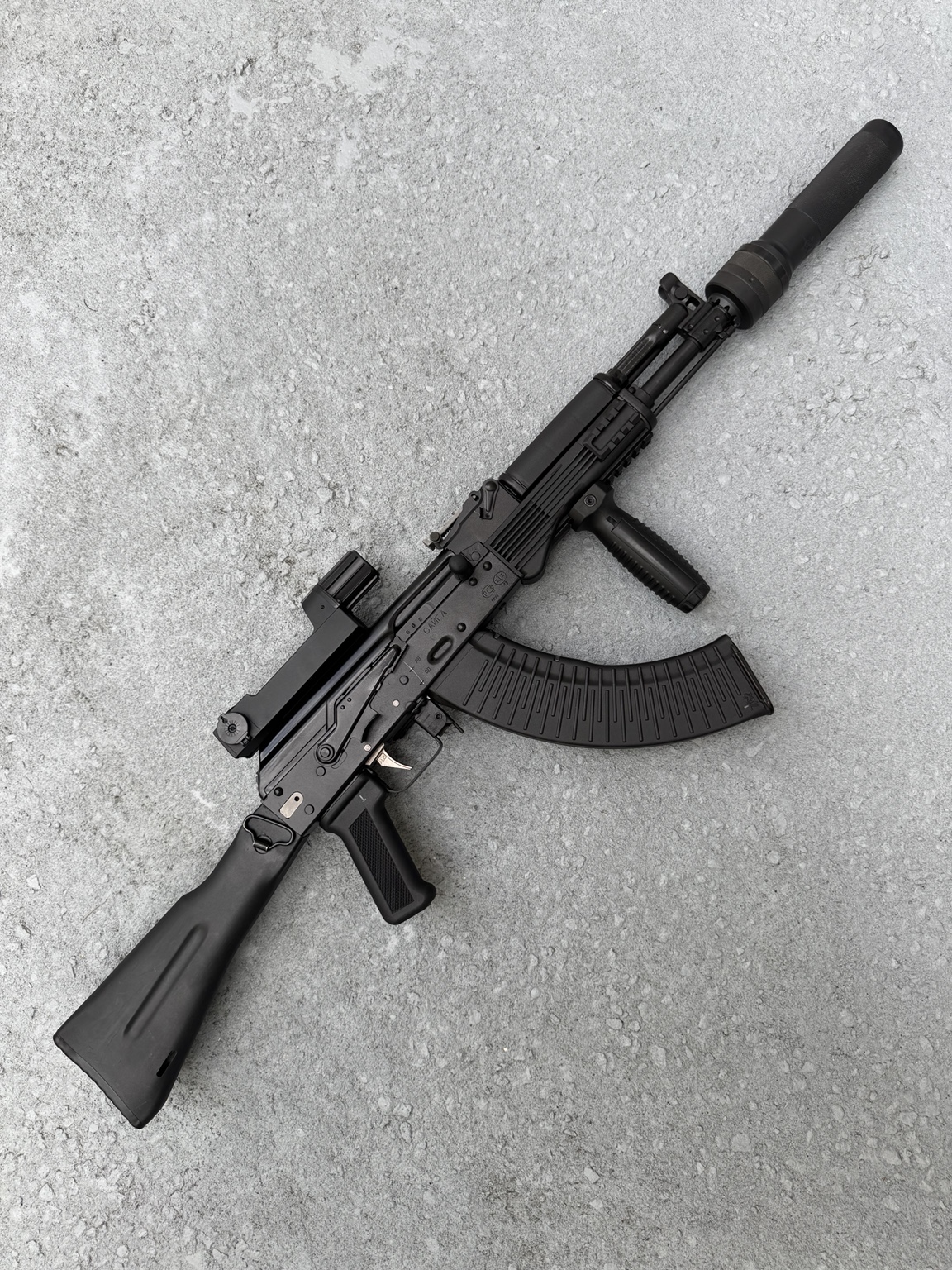 Reverse view of Russian Saiga-based AK-104 configuration with Kobra optic and suppressor